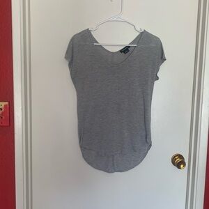 Women’s Trouvé tee size XXS. Color grey. Extra long back and shorter in front.